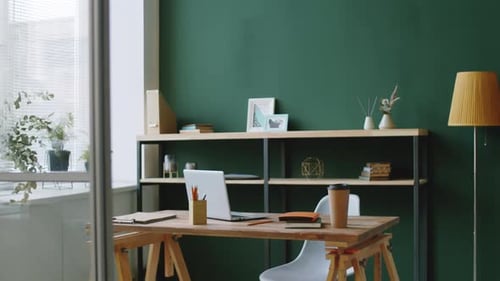 Interior of Trendy Office with Dark Green Walls