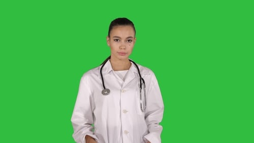 Therapist doctor woman going straight on a Green Screen