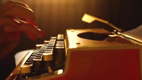Female Hand Type Text on Stationary Mechanical Typewriter