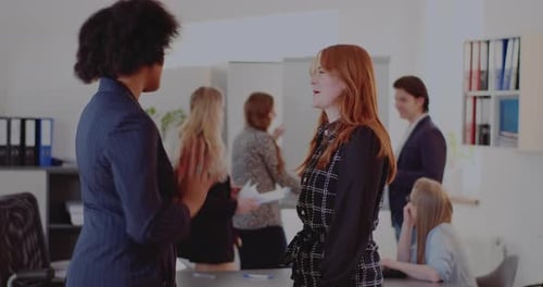 Business People Discussing Project in Bright Modern Office