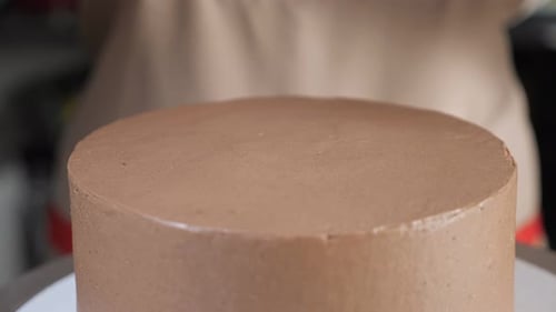 Chocolate Syrup Topping Chocolate Cake in Close Up