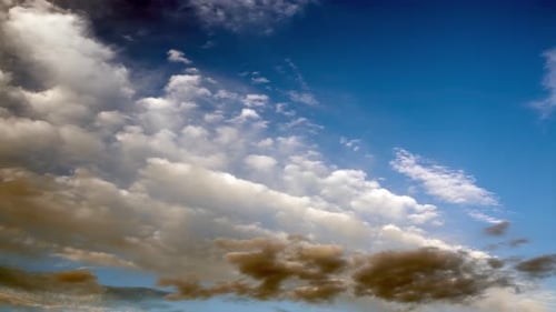 Clouds Drifting Slowly Across the Vast Blue Sky