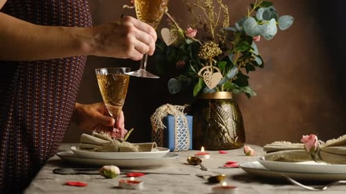 Woman Prepares Table for Romantic Celebration