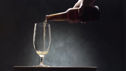 Pouring beer into a glass