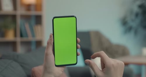 Close Up of Man Using Smartphone with Chroma Key Screen