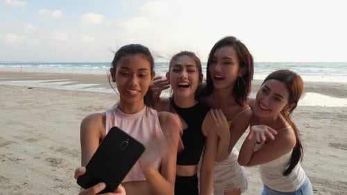 Group of Friends Taking Selfie on Beach