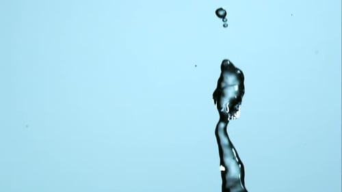 Fresh Water Flowing on Light Blue Background