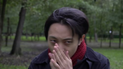 Young Adult Man Wearing Scarf Outdoors