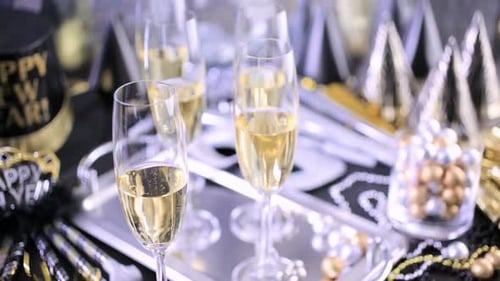 Shiny Champagne Glasses and Sparkler Decoration