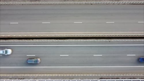 Aerial Photography of the Road Bridge Highway Cars Driving on the Road Shooting From a Height
