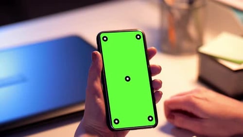 Businesswoman with Green Screen on Smartphone 22