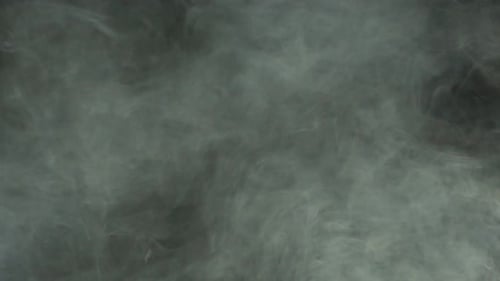Swirling Wispy Smoke on Dark Background