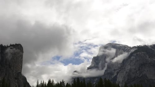 Time lapse of clouds swirling around mountains in Yosemite National Park