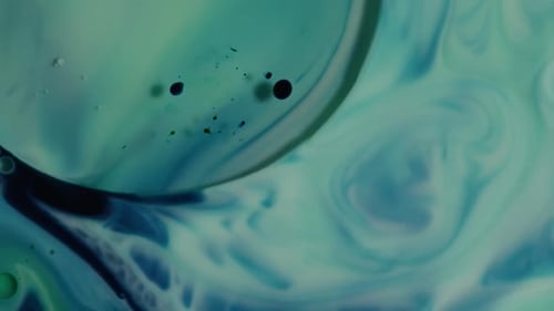 Abstract Fluid Mixing in Teal, Green and Blue