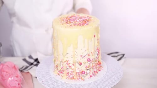 Decorated Cake with Sprinkles and White Chocolate Drizzle