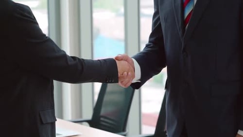 Business People Handshake with Friend at Office