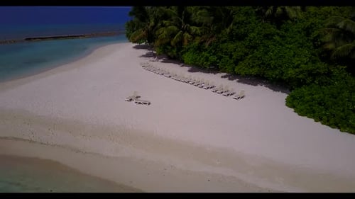 Aerial nature of luxury shore beach vacation by aqua blue water with white sand background of advent