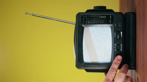 Old Portable Television Turning On with a White Screen