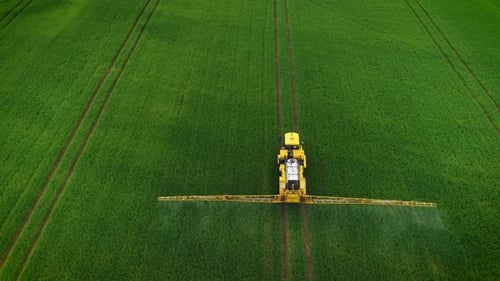 Tractor Working On The Field