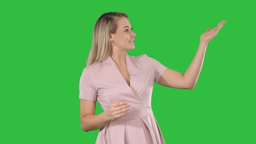 Woman Speaking and Gesturing in Front of Green Screen
