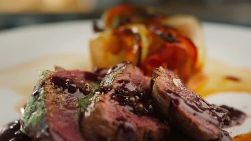 Ready dish filet mignon and ratatouille in the restaurant kitchen