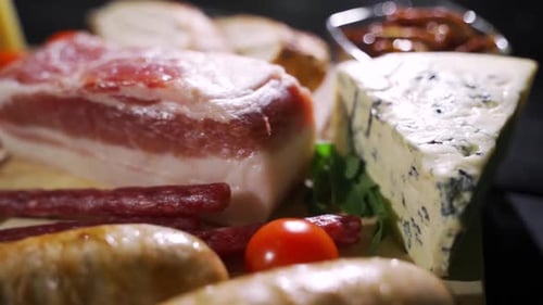 Delicious Meat and Cheese Arrangement on Cutting Board