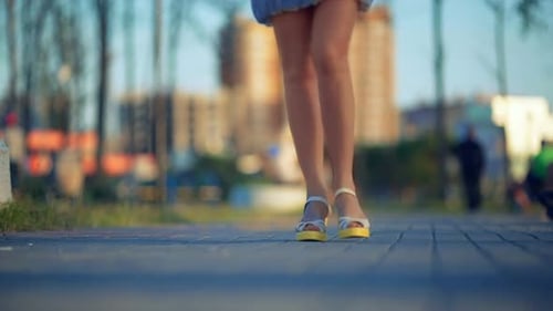 Close Up of Young Women Feet Walking on Street