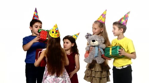Happy Children Celebrating at Birthday Party with Gifts
