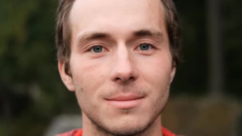 Smiling Man Close Up Portrait in Nature