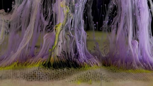 Abstract Purple and Yellow Ink Cascade on Surface