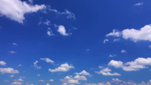 Clouds Drifting Across a Blue Sky Time Lapse