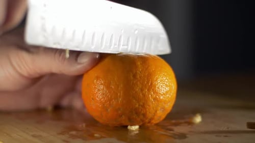 slicing oranges for orange wine