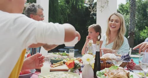 Family Gathering for a Meal Outdoors