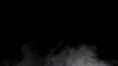 Wispy Gray Smoke Rising on Black Background