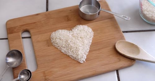 Rice Heart Shape on Cutting Board