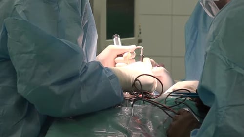 Surgeons Perform Intricate Operation in Sterile Environment