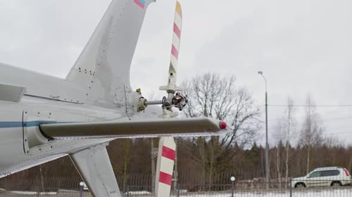 Close View of Rear Blades of Helicopter Inscription in Russian is Duplicated in English