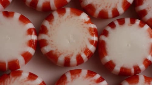 Rotating shot of peppermint candies - CANDY PEPPERMINT 023
