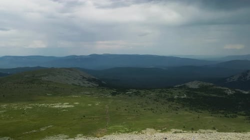 View from the mountain to the green valley