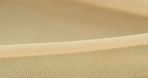 Beige Honeycomb Mesh Material Close Up
