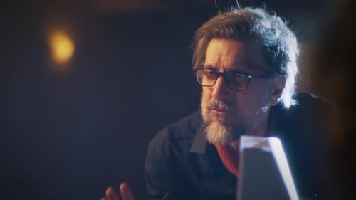 Man Speaking with Hand Gestures in Close Up