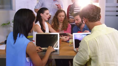 Diverse Team Collaborating in Modern Office Space