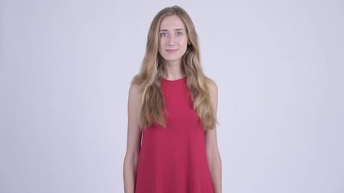 Young Fair Haired Woman in Red Dress Smiling
