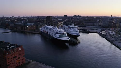 Industrial Buildings Surrounded By Ocean Waters By the Dock and Cruise Ships