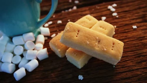 Cookies, Marshmallows, and Hot Chocolate on Wooden Table
