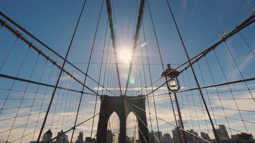 The Sun Shines on the Elegant Brooklyn Bridge in New York