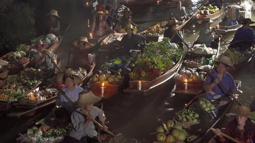 Damnoen Saduak Floating Market or Amphawa. Local people sell fruits, traditional food on boats