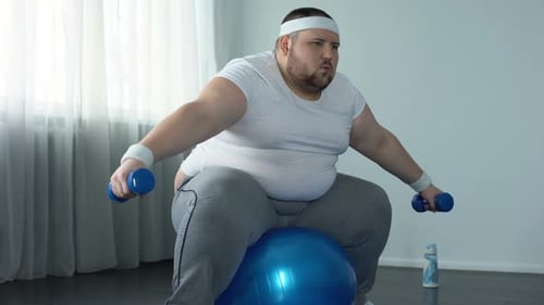 Weak Obese Male Struggling to Lift Dumbbells, Lack of Physical Activity, Diet