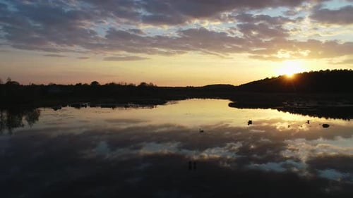 Beautiful Sunset Above the Wild Swamp and Forest