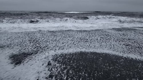 Waves Crashing on Black Sand Beach Landscape